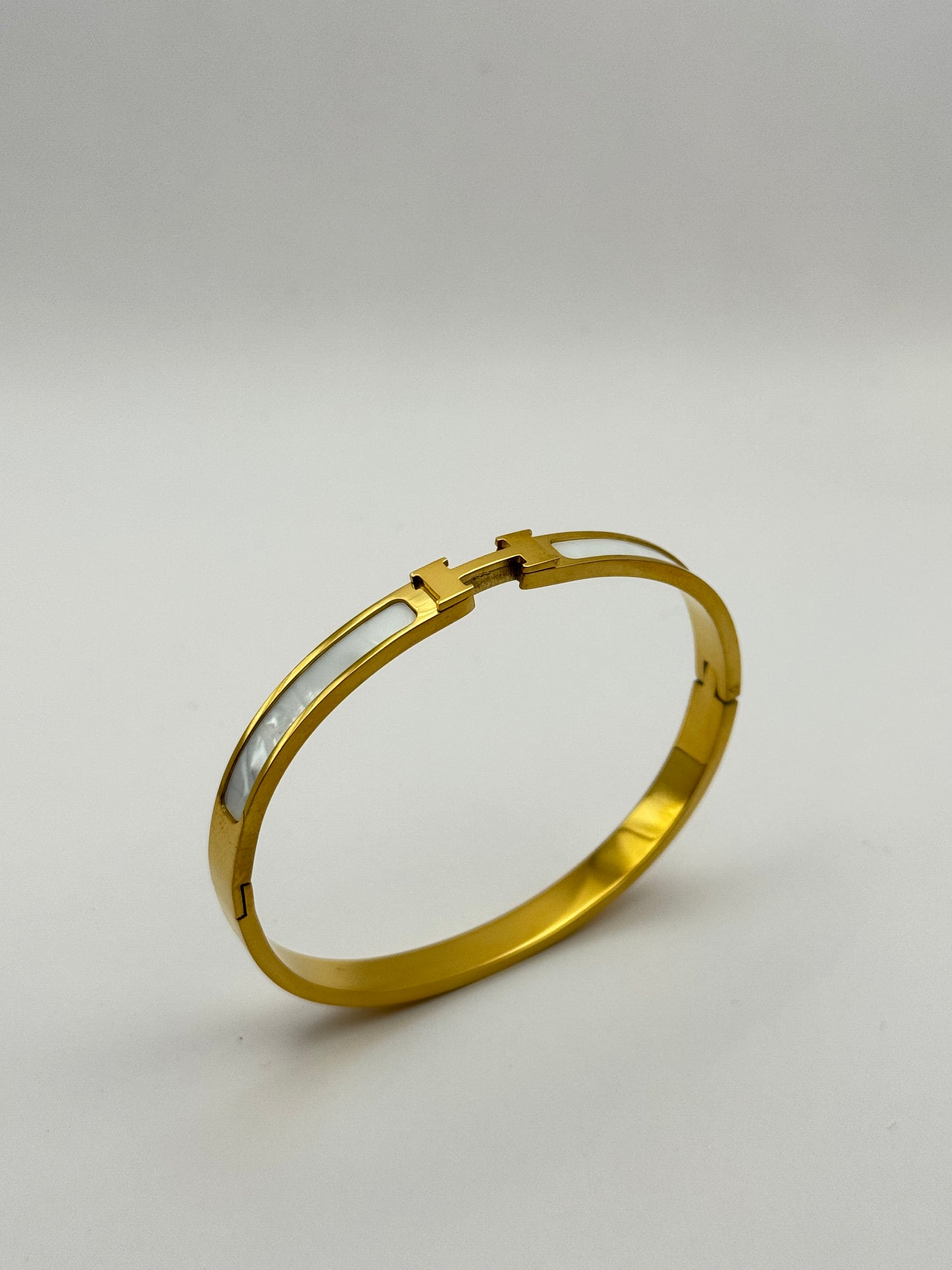 H - Armreif 18k vergoldeter Titanstahl